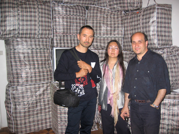 Gulnara Kasmalieva & Muratbek Djumaliev in front of their Installation <i>Transiberian Amazons<i>
<br>Central Asia Pavilion
<br>Venice Biennial, 2005